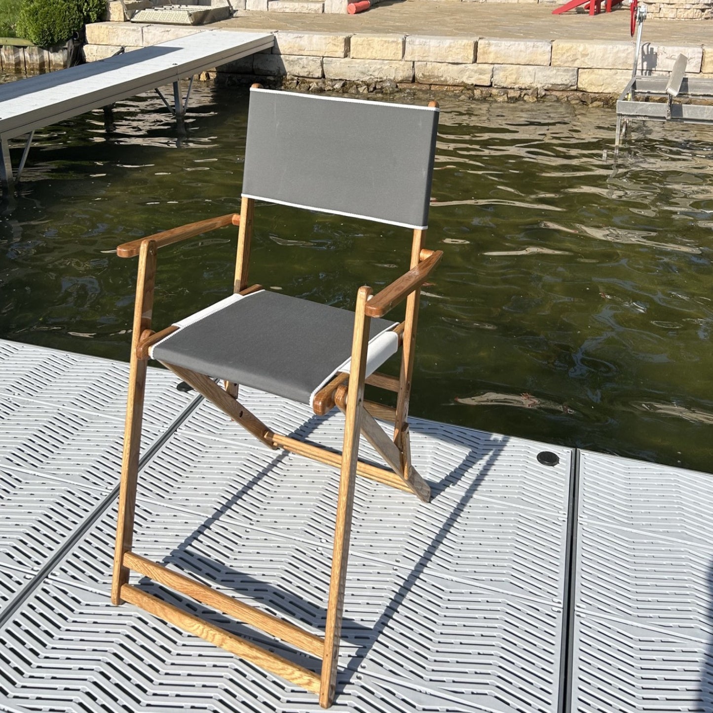 Coastsetter Outer Banks Chair in Grey on a waterside dock