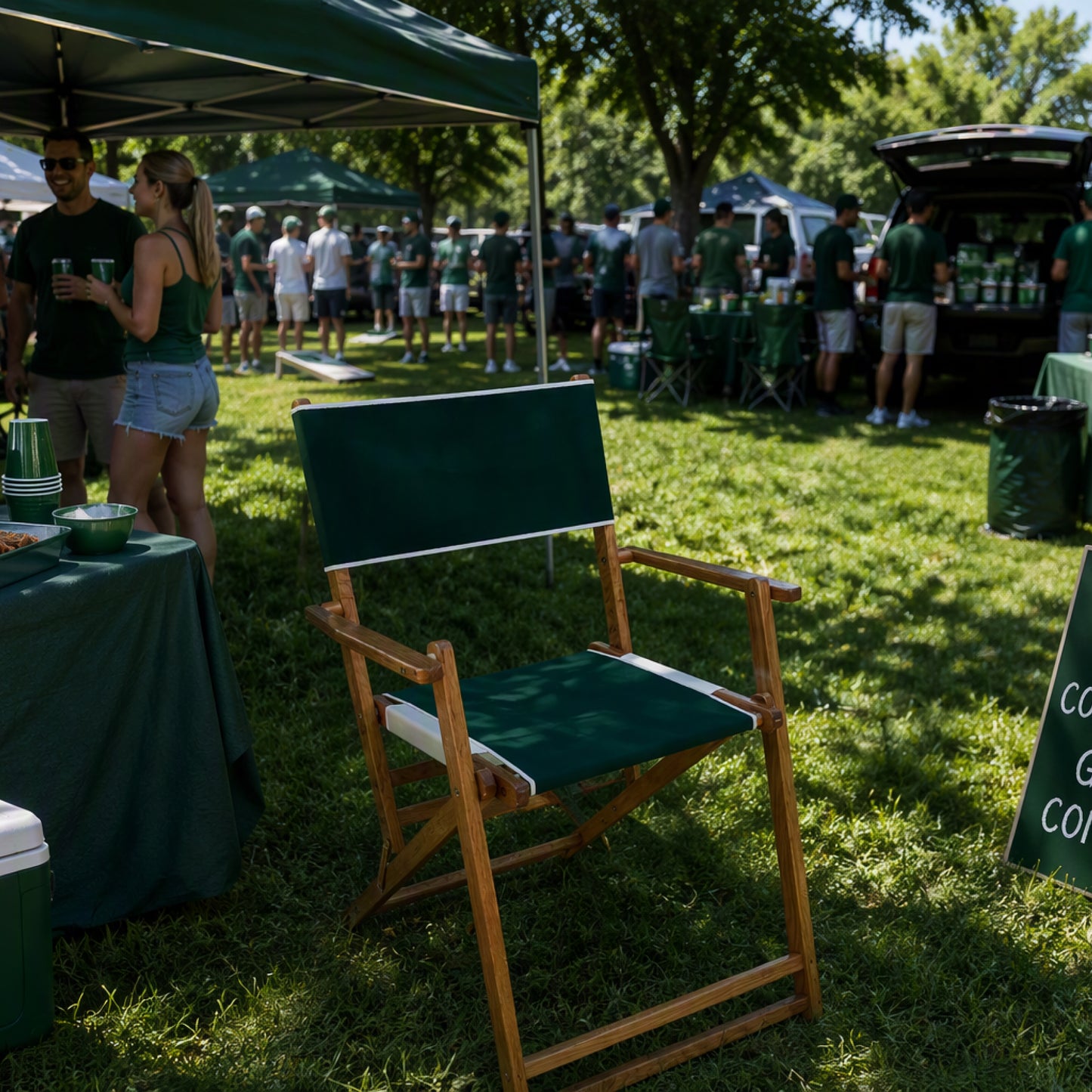 Coastsetter Tailgate Chair in green and white at a tailgate