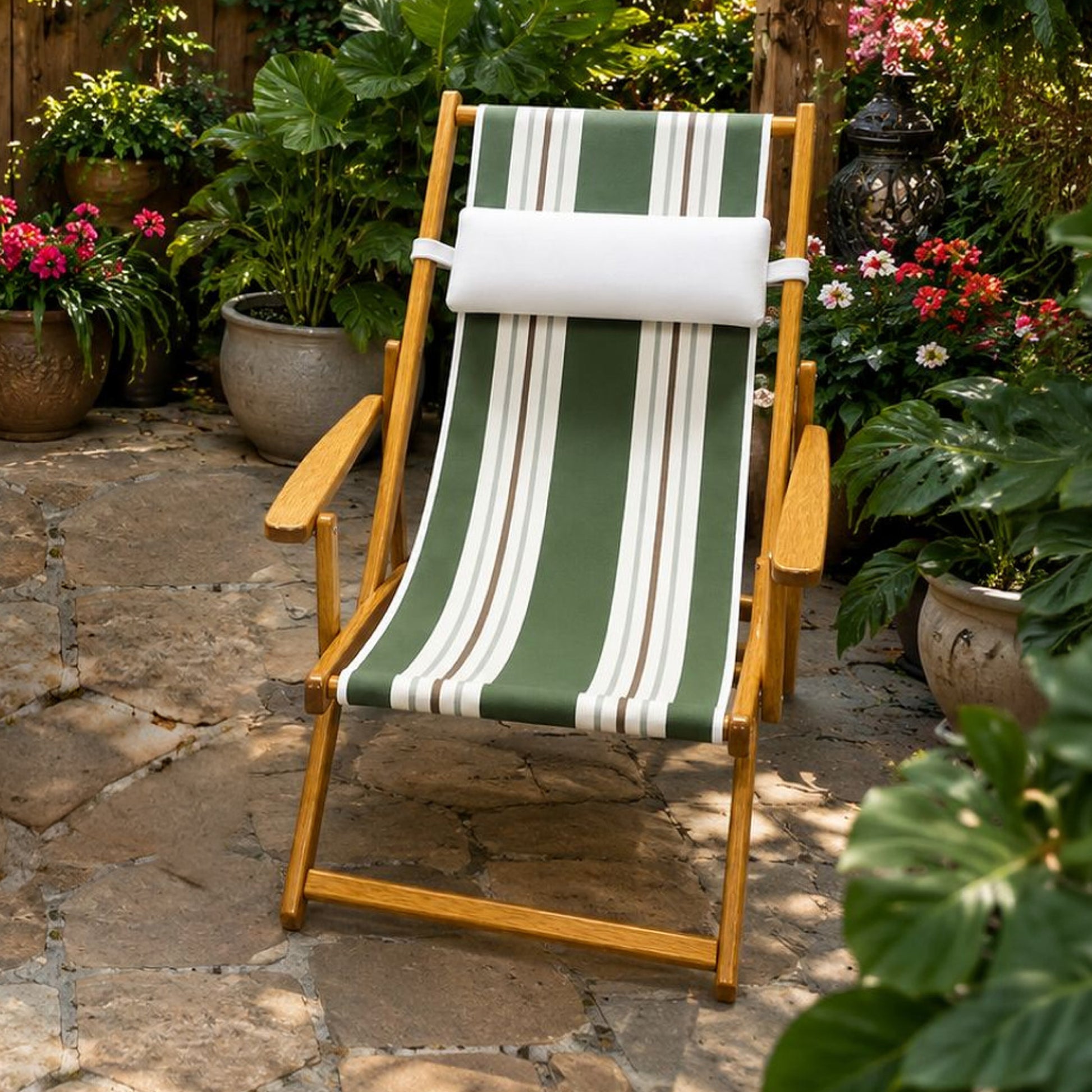 Coastsetter Sling Chair in Green Stripes on a garden patio