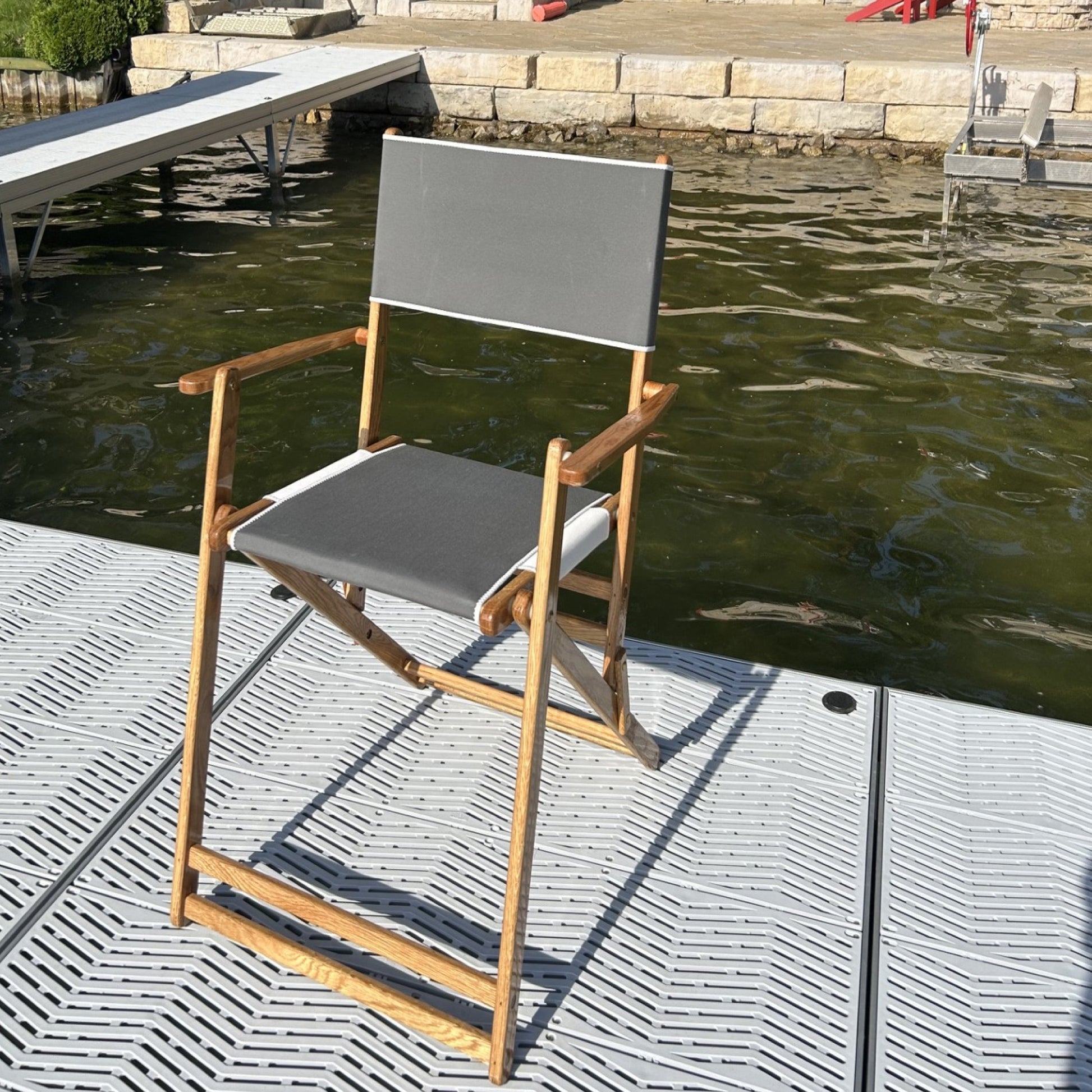 Coastsetter Outer Banks Chair in Grey on a waterside dock