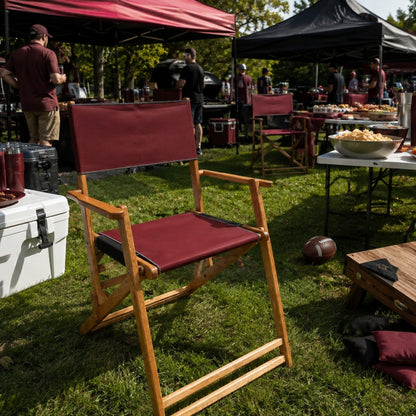 Coastsetter Tailgate Chair in burgundy and black at a tailgate