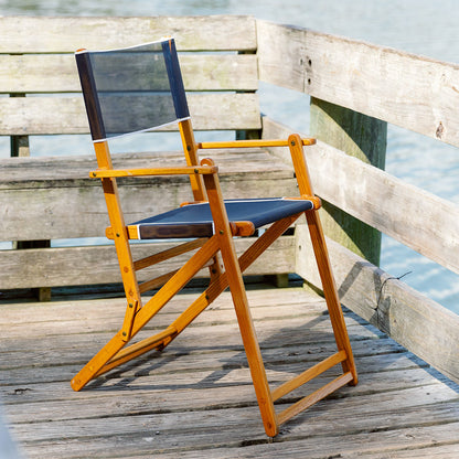 Coastsetter Outer Banks Chair in Navy on a stone patio