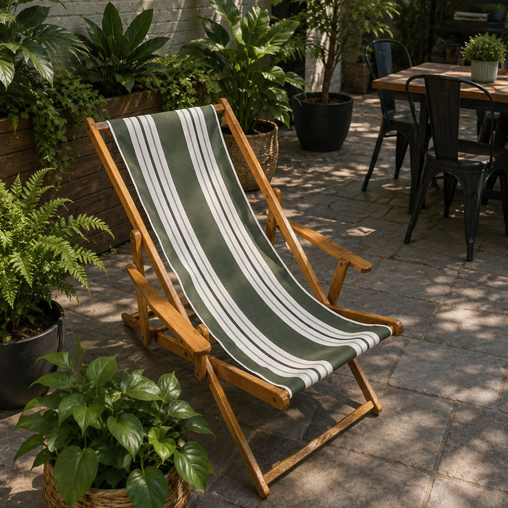 Coastsetter Sling Chair in Green Stripes on a patio, side view